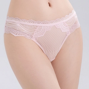 Detailed close-up of pink floral lace and sheer polka dot mesh on low-rise panties