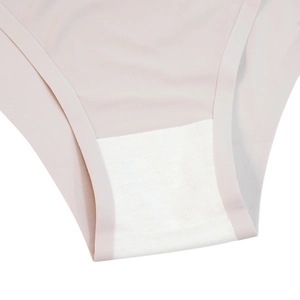 Detail of white cotton lining and seamless edge on breathable leopard print panties