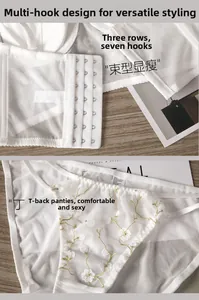 Détail du soutien-gorge en dentelle blanche avec 3 rangs 7 agrafes et broderie florale