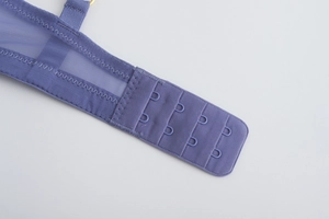 Detail of violet blue lace bra back closure with breathable mesh and 4-row hook eye