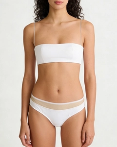 Detailed front view of white bikini set with thin straps and contrast waist trim