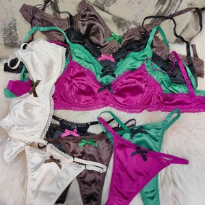 Lace-trimmed satin lingerie set with bow detail shown in multiple elegant colors