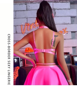 Detailed back view of pink lace lingerie set with adjustable straps and satin finish