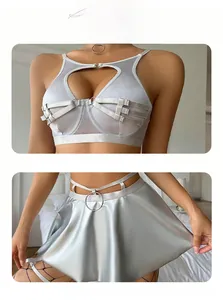 Detailed close-up of silver sexy lingerie set featuring heart cutout and metal rings