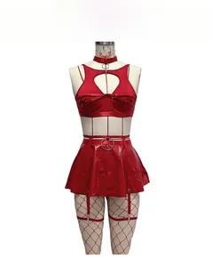 Detail of red faux leather lingerie set with heart cutout and metal ring accents