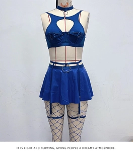 Close-up of electric blue lace lingerie set with heart cutout bra and pleated skirt