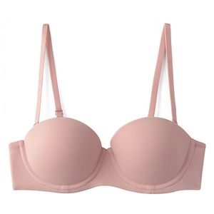 Seamless push up strapless bra in light pink with smooth cups and adjustable straps