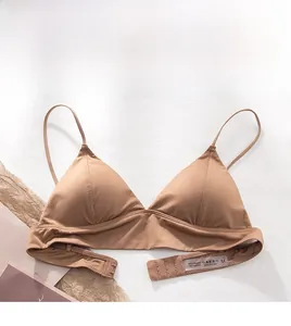 Detail of silk-texture triangle bralette with adjustable straps and hook-and-eye closure