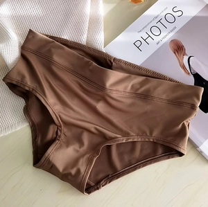 Close-up of seamless dark coffee panties with crossover high waist design and soft texture