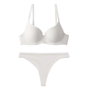 Detail of white seamless lingerie set with underwire bra and matching thong