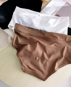 Three-pack of seamless high-waist panties in black, white, and brown breathable fabric