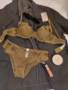 Detailed view of olive green embroidery lace lingerie set with underwire bra and briefs
