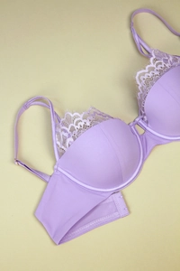 Detailed view of lilac lace bra showing smooth fabric and delicate eyelash lace trim