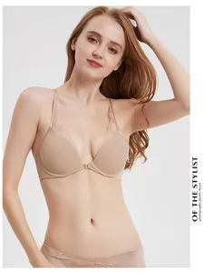 Detailed close-up of a nude front-closure push-up bra with delicate lace back straps