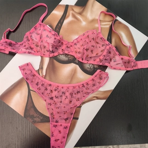 Pink floral lace lingerie set with sheer mesh bra and matching panty for women