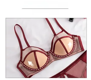 Detailed view of wine red mesh lingerie set with supportive underwire and double straps