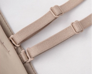 Detailed close-up of adjustable elastic shoulder strap with high-quality plastic hardware