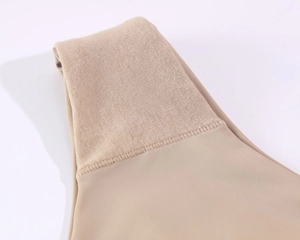Close-up of seamless nude bra showing breathable honeycomb mesh and flat stitching