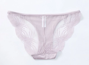 Detail of lavender lace panties with silky satin gusset and delicate wavy edges
