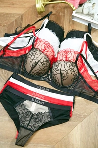 Detail of rose floral embroidery on lace push-up lingerie set with ELEGANT letter band