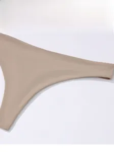 Close-up of light brown seamless thong with high-cut design and smooth texture