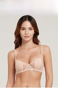 Close-up of beige French lace bra featuring floral embroidery and mesh details