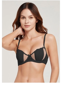 Detail shot of black lace and nude mesh bra with thin straps and a tiny bow decoration