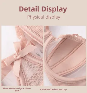 Detailed view of pink lace bra featuring a satin bow and rabbit-ear anti-slip cup inserts