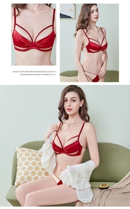 Detail of wine red satin lingerie set featuring crossed decorative straps and hollow design