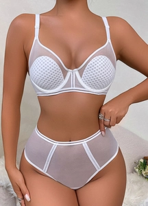 Detailed view of white mesh lingerie set with breathable pads and soft underwire support