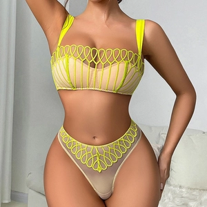 Set lingerie giallo neon con mesh trasparente e motivi geometrici ricamati a mano