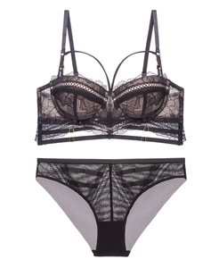 Detailed view of black floral lace lingerie set with underwire cups and strappy details