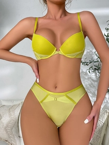 Lime green lingerie set featuring push-up wired bra and breathable mesh panty with rings