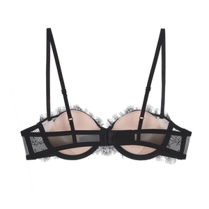 Detailed close-up of black eyelash lace back band and mesh fabric of the push-up bra