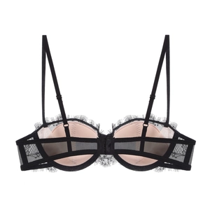 Detailed view of black eyelash lace bra with adjustable straps and breathable mesh wings