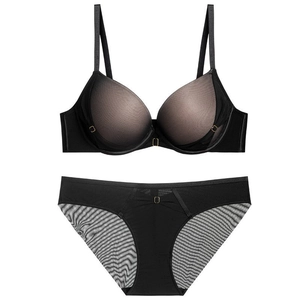 Elegant black push-up lingerie set with mesh lace detailing and gold metal accents