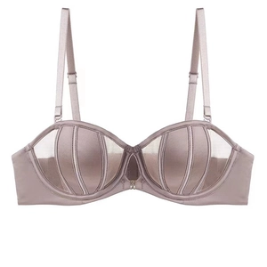 Detail of mauve 1/2 cup strapless bra with shell stripes and mesh stitching accents