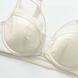 Lace-trimmed silk satin front-close bra with adjustable straps in creamy beige color