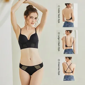 Seamless black push up lingerie set with multiway straps and mesh detail
