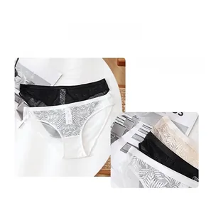 Close-up of elegant leaf lace texture on breathable low-waist panties in three colors