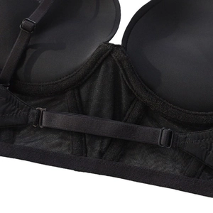 Seamless black push-up bra with breathable mesh fabric and adjustable back support strap