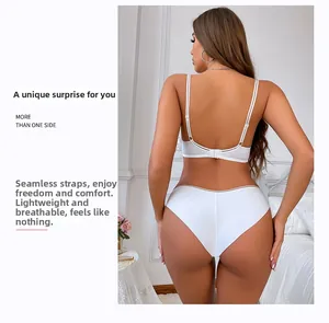 Detail of white seamless lingerie set with thin straps and breathable fabric on model
