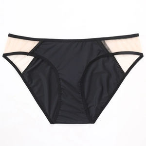 Sexy black low-waist thong for women with seamless mesh panels and smooth finish