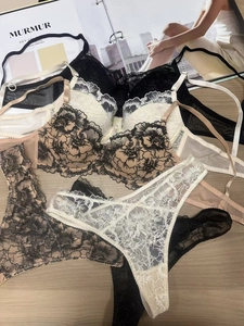 Macro detail of French floral embroidery and delicate lace on underwired lingerie