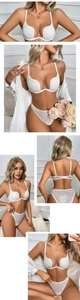 Close-up of white lace lingerie set with deep U-neck bra and matching leopard mesh panties