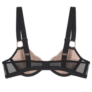 Detail view of black bra showing wide adjustable straps and breathable mesh back panel