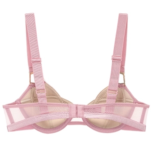 Detail view of pink lace bra back with adjustable wide straps and mesh fabric texture