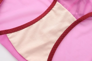 Detail of breathable pink mesh fabric with beige cotton crotch lining and reinforced stitching