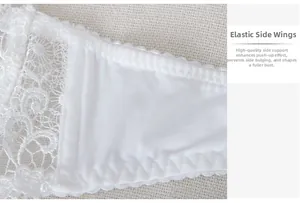 Detailed close-up of white lace bra elastic side wings with built-in bone support