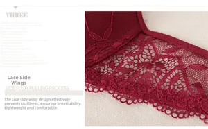 Detailed view of breathable floral lace side wings on a deep red push-up bra
